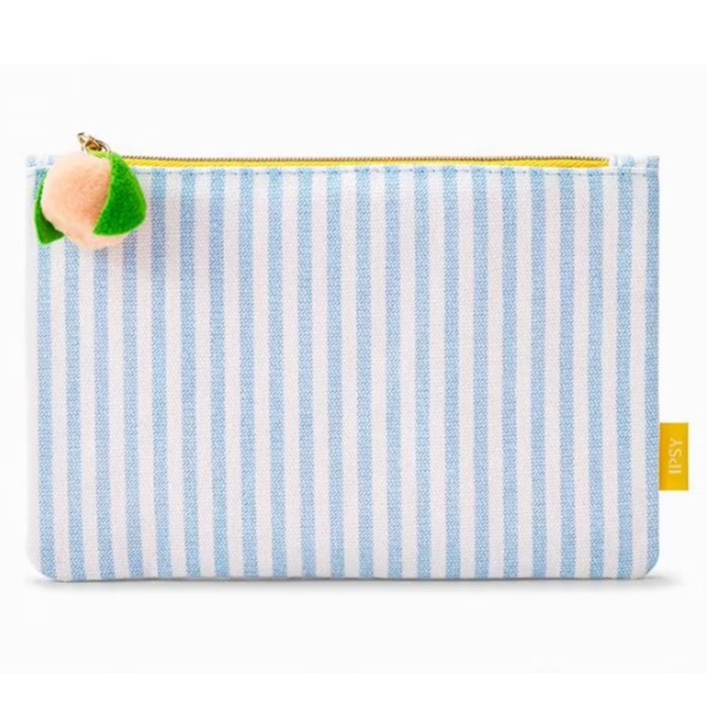 Ipsy blue and white vertical stripe makeup bag with peach zipper pull - Picture 3 of 3